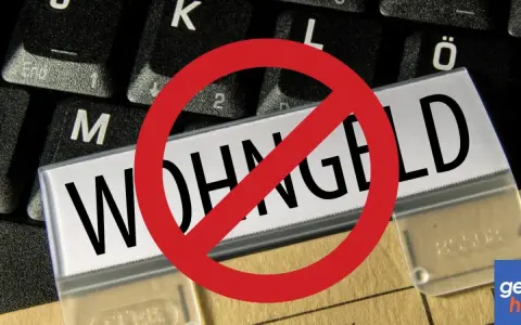Verbotsschild über dem Wort "WOHNGELD". Einmalzahlungen werden beim Wohngeld nicht angerechnet.