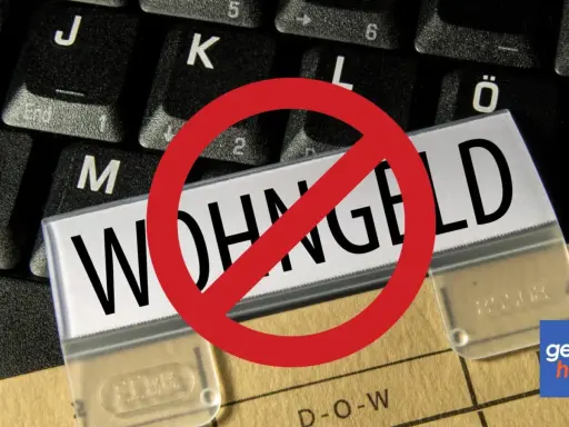 Verbotsschild über dem Wort "WOHNGELD". Einmalzahlungen werden beim Wohngeld nicht angerechnet.